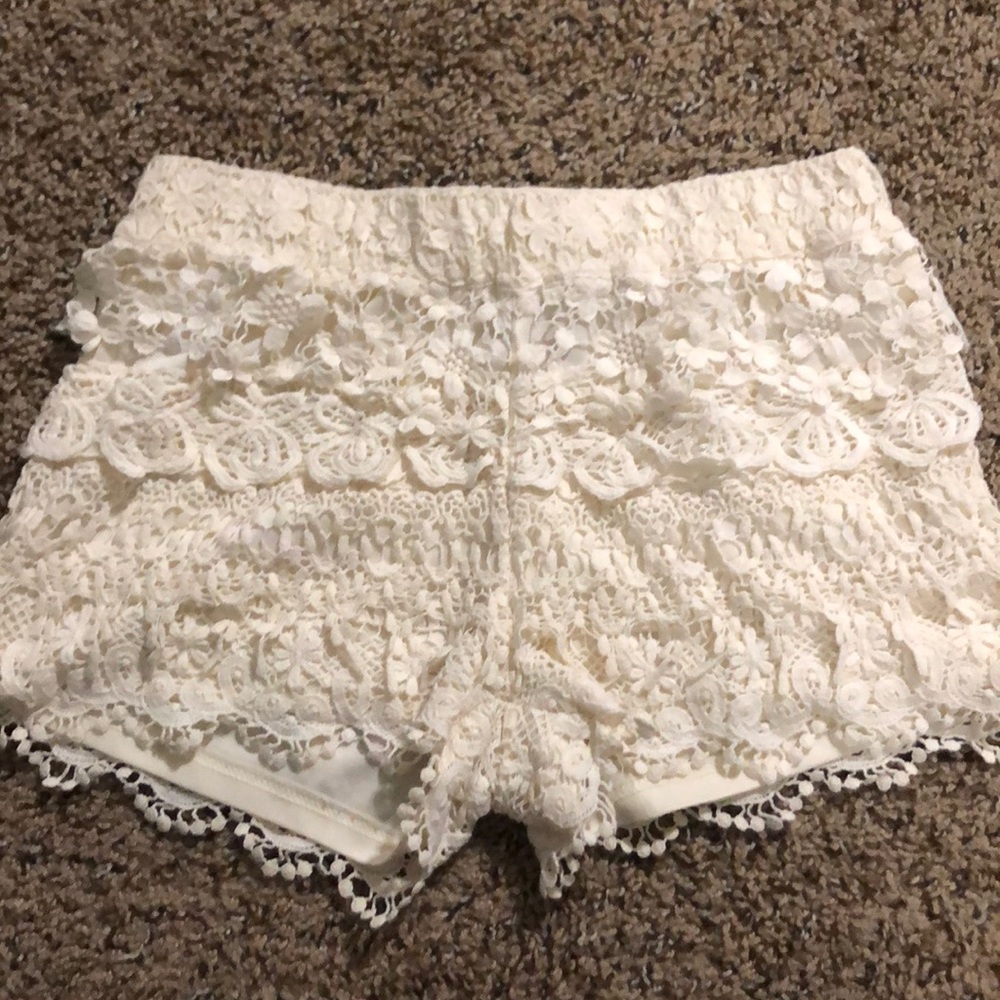 White lace shorts